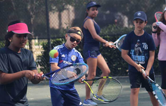 kids junior tennis lessons group class